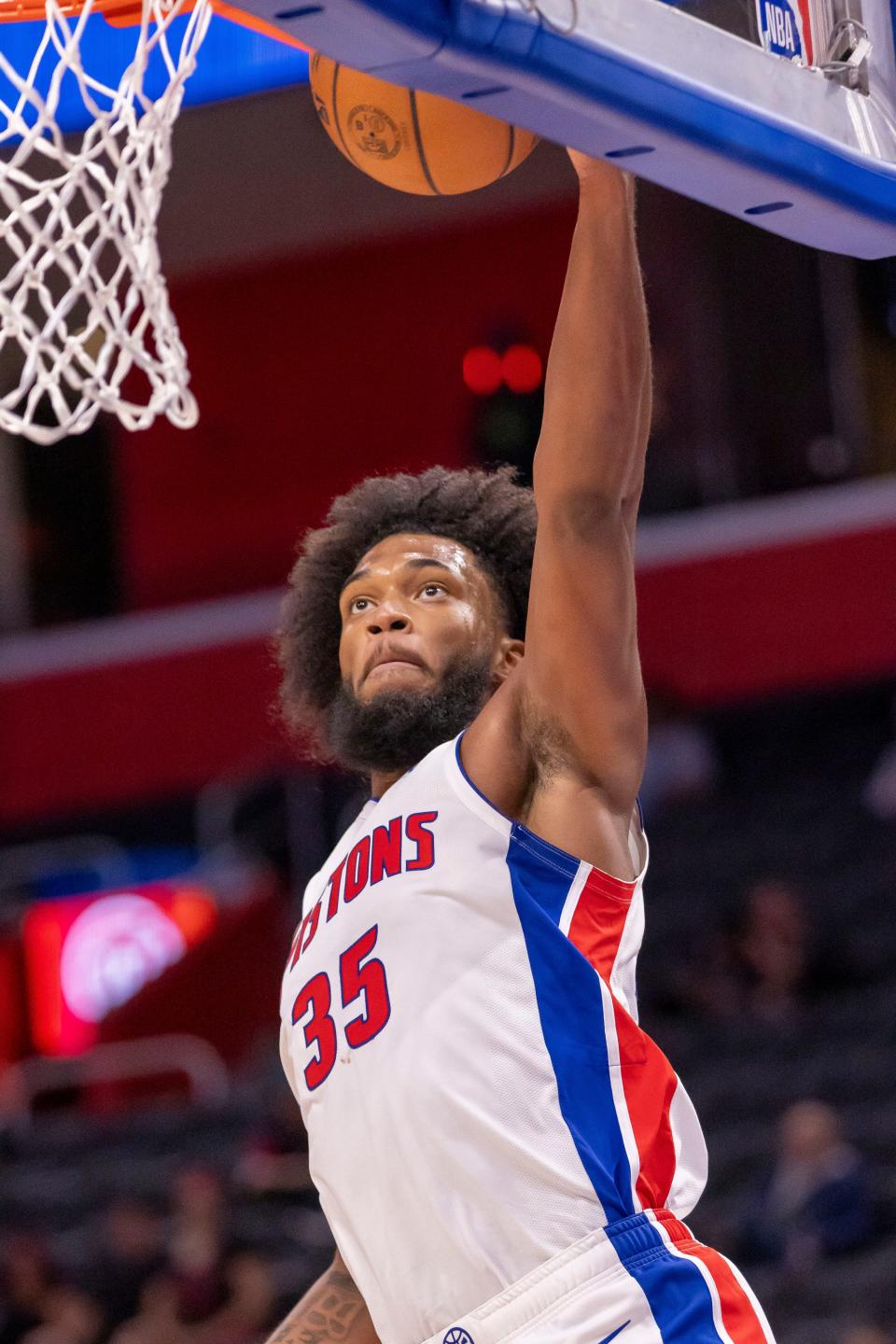 Detroit Pistons forward Marvin Bagley III (35) dunks the ball against the Phoenix Suns during the second half of a pre-season game at Little Caesars Arena in Detroit on Sunday, Oct. 8, 2023.