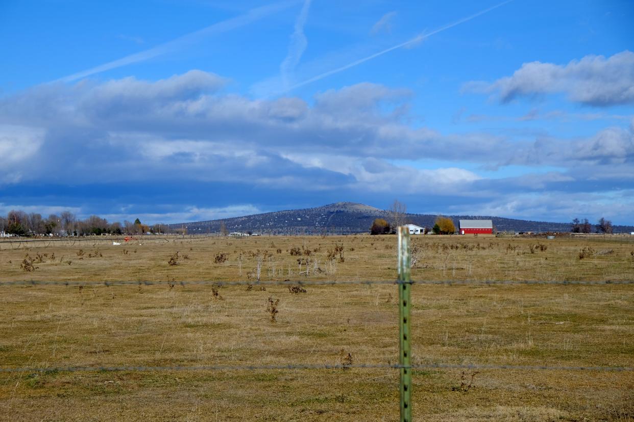 Madras Mountain Views Scenic Bikeway, a 30 mile route in Central Oregon, takes rides through high desert farmland where views of Cascade Mountain peaks like Mount Jefferson can be seen.