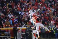 <p>Tennessee Titans wide receiver Rishard Matthews (18) makes a catch between Kansas City Chiefs defensive back Eric Berry (29) and defensive back Marcus Peters, rear, during the first half of an NFL football game in Kansas City, Mo., Sunday, Dec. 18, 2016. (AP Photo/Charlie Riedel) </p>