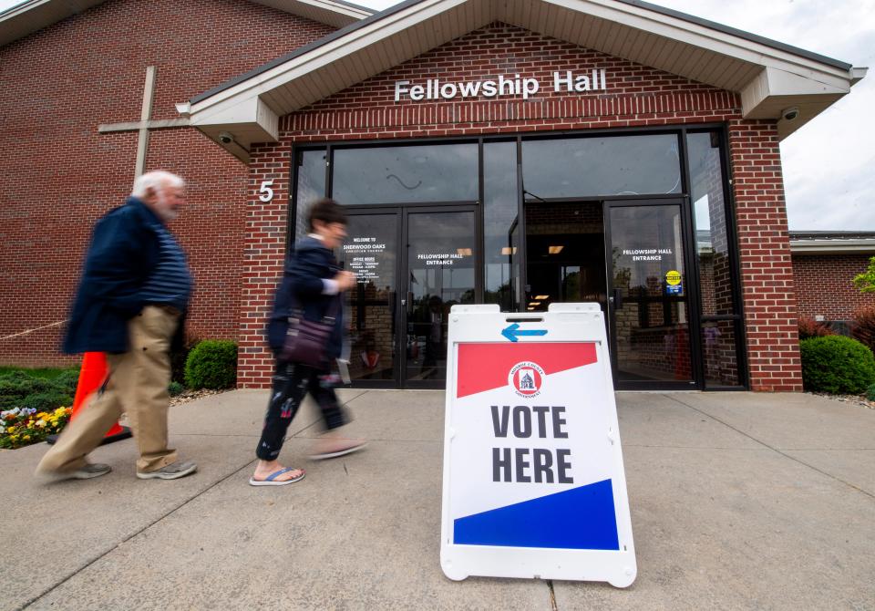 Voters walk into Sherwood Oaks Christian Church to vote on Tuesday, May 7, 2024.