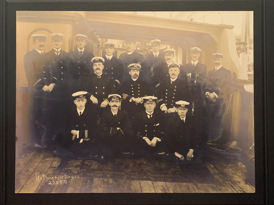 Samuel Smith (front, second left), made a wooden cross from oak taken from the Titanic. (PA)