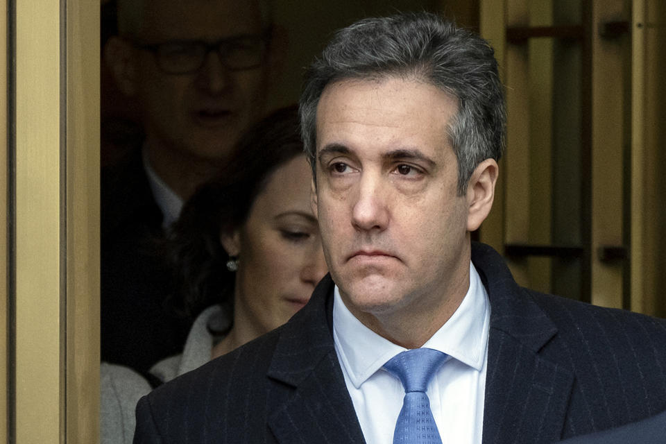 FILE - In this Dec. 12, 2018, file photo, Michael Cohen, President Donald Trump's former lawyer, leaves federal court after his sentencing in New York. Search warrants unsealed Thursday, July 18, 2019, shed new light on President Trump's role as his campaign scrambled to respond to media inquiries about hush money paid to two women who said they had affairs with him. The investigation involved payments Cohen helped orchestrate to porn actress Stormy Daniels and Playboy centerfold Karen McDougal. (AP Photo/Craig Ruttle, File)