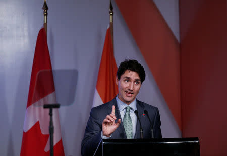 Canadian Prime Minister Justin Trudeau addresses a gathering during 'India-Canada Business Session', in New Delhi, India, February 22, 2018. REUTERS/Adnan Abidi