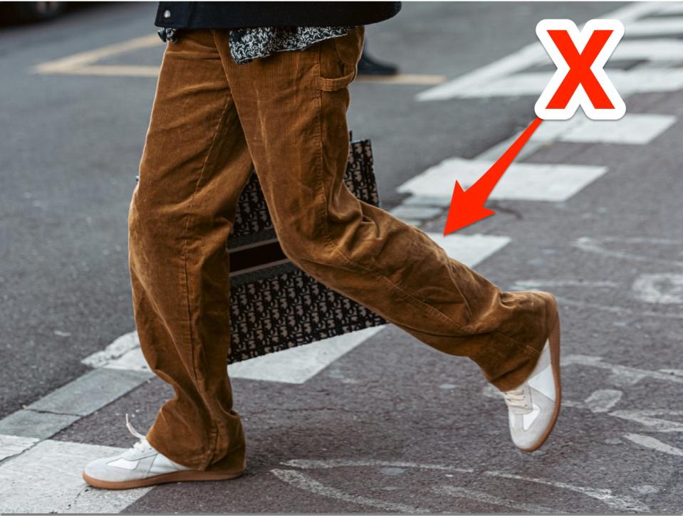 An x pointing at corduroy pants.