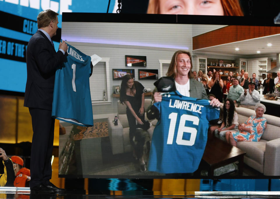Just weeks after he said, "I do," Lawrence was drafted to the Jacksonville Jaguars.