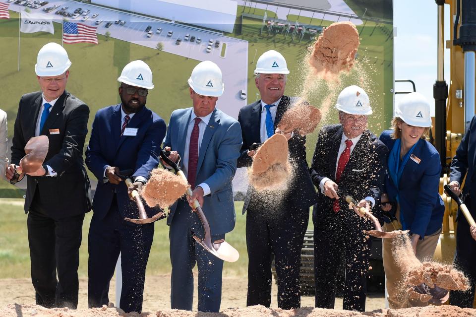 CEO of Aurubis AG Roland Harings (right) smiles as the Aurubis Richmond groundbreaking begins at Augusta Corporate Park on Friday.