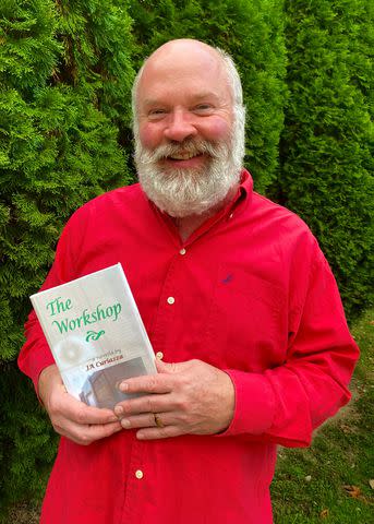 <p>Courtesy of the Curiazza Family </p> Jimmy Curiazza with his novella, “The Workshop.”