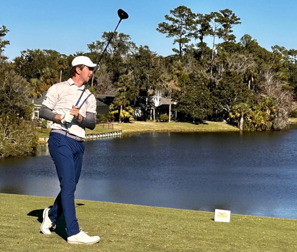 University of North Florida senior Robbie Higgins follows the flight of his tee shot at the par-417th hole at the TPC Sawgrass Dye's Valley Course on Tuesday during the final round of the Sea Best Invitational. Higgins won by one shot over Florida's Ian Gillian.