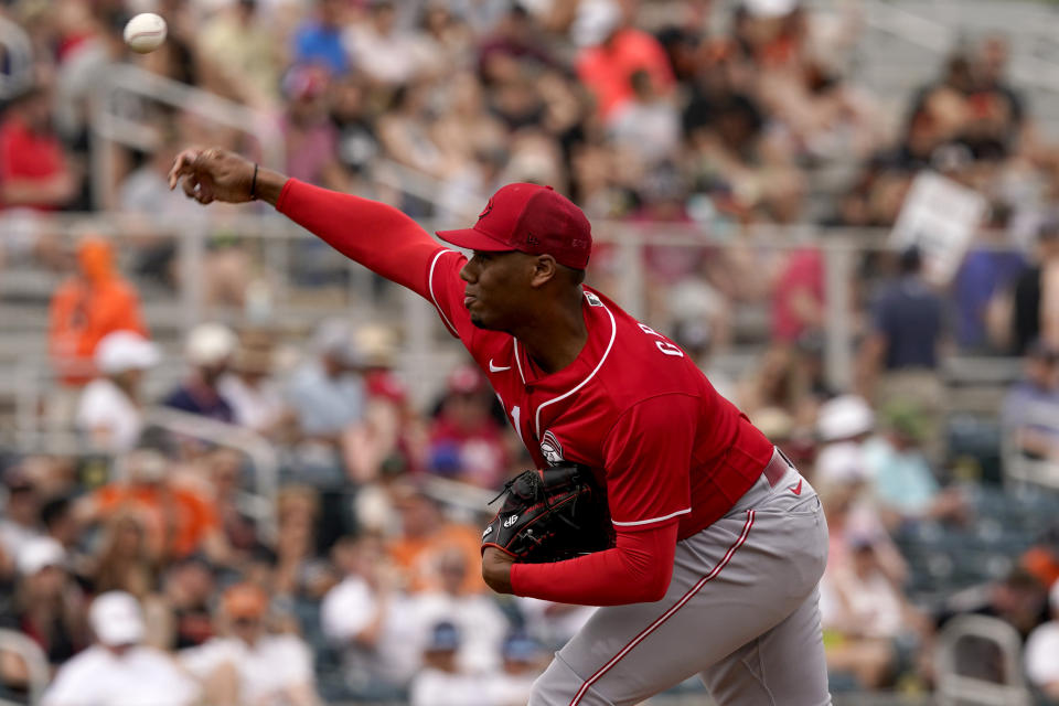 Cincinnati Reds starting pitcher Hunter Greene throws during the first inning of a spring training baseball game against the San Francisco Giants, Saturday, March 26, 2022, in Scottsdale, Ariz. (AP Photo/Matt York)