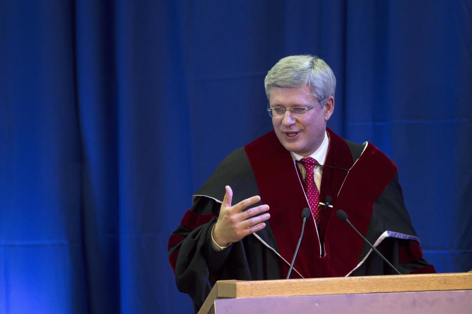 Canada's Prime Minister Harper speaks after he was awarded a honorary Doctor of Philosophy degree from Tel Aviv University