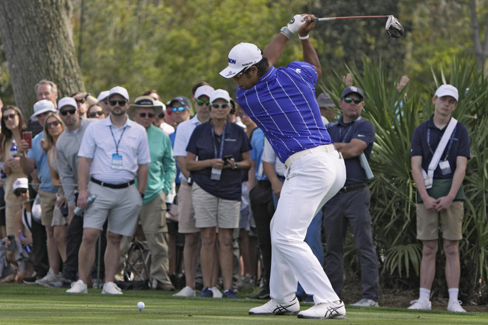 Hideki Matsuyama, of Japan, prepares to hit his tee shot on the ninth hole during the first round of The Players Championship golf tournament Thursday, March 14, 2024, in Ponte Vedra Beach, Fla. (AP Photo/Lynne Sladky)