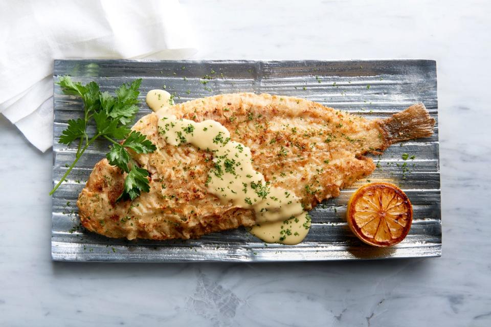 Whole Dover Sole "Meuniere" served with lemon butter.