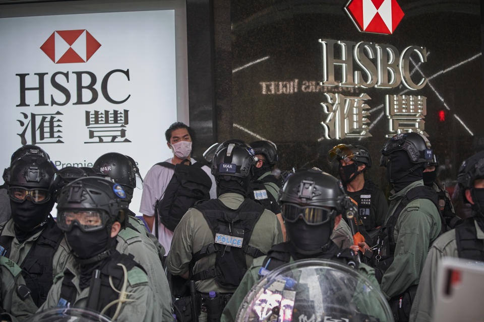 HONG KONG - 2020/05/27: A young man is arrested for unauthorized assembly during the Hong Kong protests.  Hong Kong police fired pepper pellets in the central business district and arrested almost 300 people after protesters gathered in opposition to the national anthem and national security law. The mass protests in Central followed a morning of relative calm as lawmakers prepared to debate a contentious national anthem law at the Legislative Council. (Photo by Tang Yan/SOPA Images/LightRocket via Getty Images)