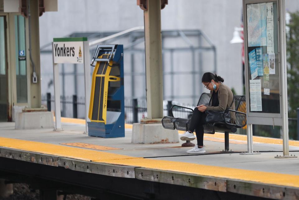 Commuters wait on the platform at Yonkers Station on Thursday, September 16, 2021.  