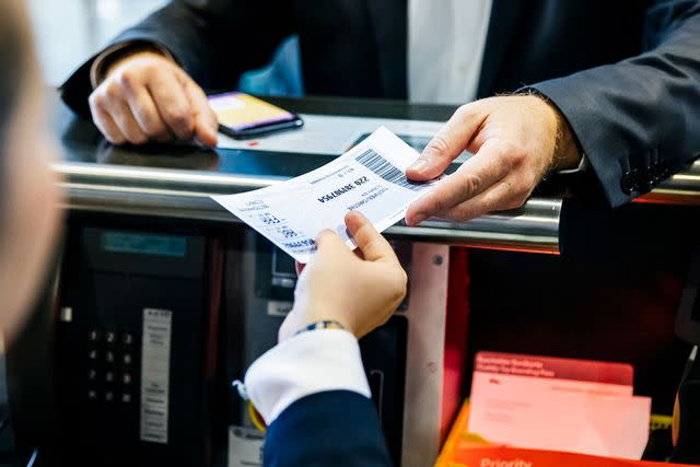 <p>Hinterhaus Productions/Getty</p> Stock image of a boarding pass