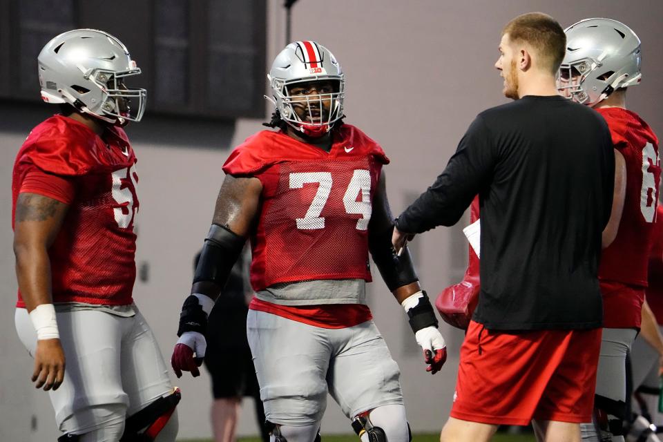 Mar 7, 2023; Columbus, Ohio, USA;  Ohio State Buckeyes offensive lineman Donovan Jackson (74) works out during spring football drills at the Woody Hayes Athletic Center. Mandatory Credit: Adam Cairns-The Columbus Dispatch