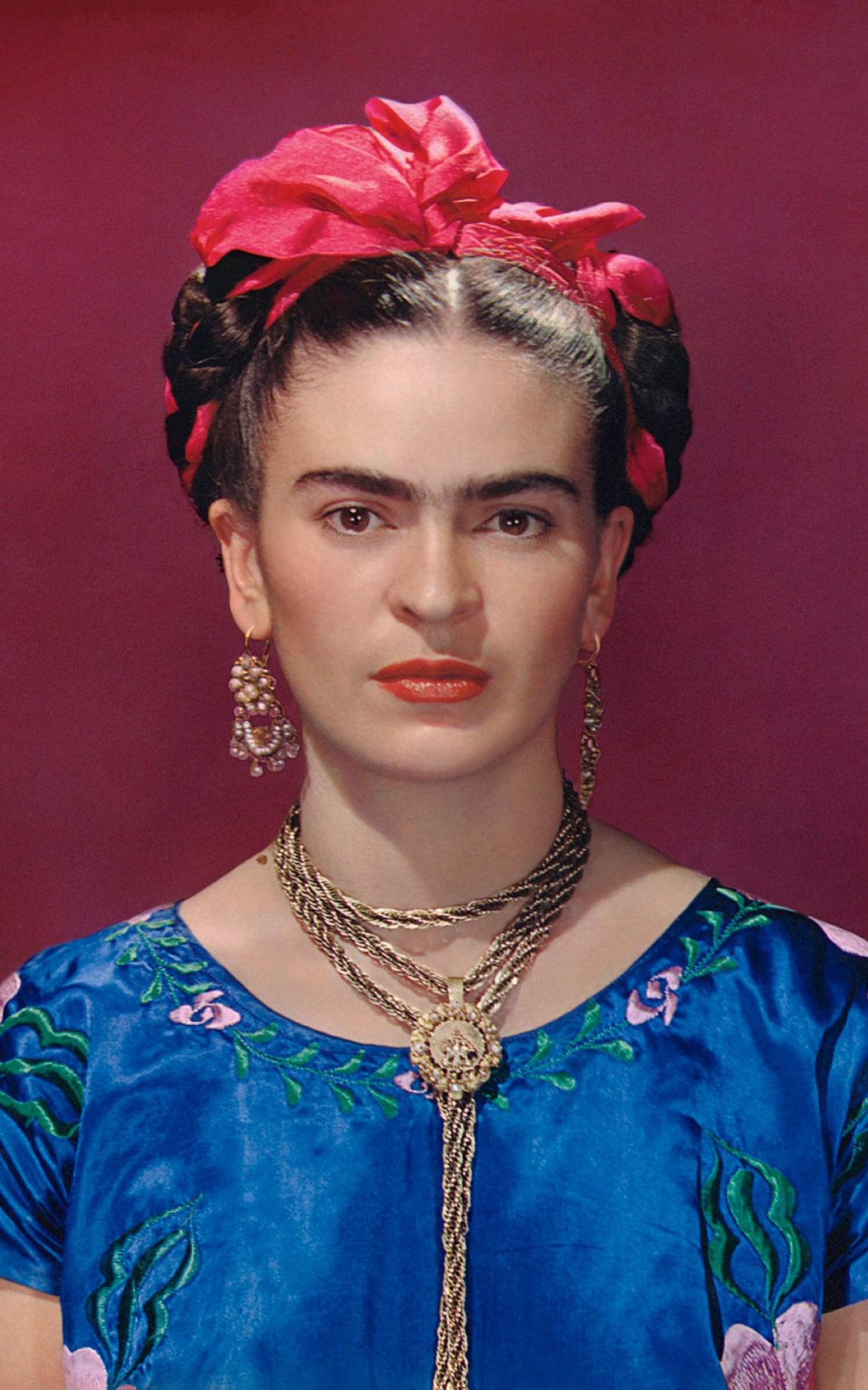 Frida Kahlo in blue satin blouse, 1939, photograph by Nickolas Muray - Nickolas Muray Photo Archives