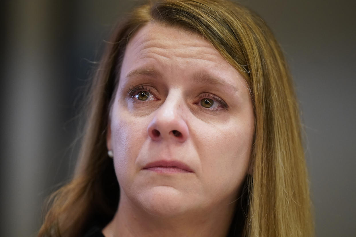 Gabby Petito's mother Nichole Schmidt, looks on during a news conference Thursday, Nov. 3, 2022, in Salt Lake City. Gabby Petito's family filed a wrongful death lawsuit alleging that police failed to recognize their daughter was in a life-threatening situation last year when officers investigated a fight between her and her boyfriend. The fight happened weeks before authorities say the boyfriend killed her while the couple was on a cross-country van trip. (AP Photo/Rick Bowmer)