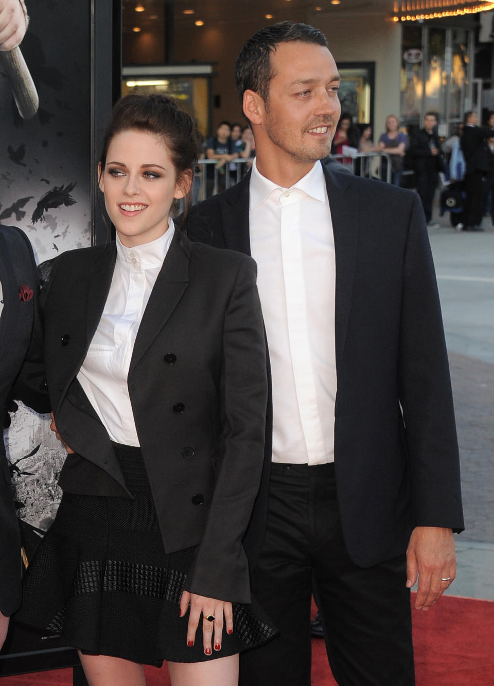 FILE - This May 29, 2012 file photo shows actress Kristen Stewart and director Rupert Sanders attending the "Snow White and the Huntsman" screening in Los Angeles. Stewart and director Rupert Sanders are apologizing publicly to their loved ones following reports of infidelity. The 22-year-old actress and the 41-year-old filmmaker issued separate apologies to People magazine Wednesday, July 25, saying they regret the hurt they have caused. Stewart has been in a relationship for several years with her “Twilight” co-star Robert Pattinson. Sanders is married and has two children. (Photo by Jordan Strauss/Invision/AP)