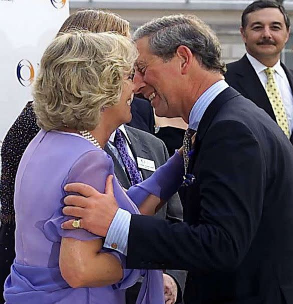 PHOTO: Camilla Parker-Bowles, in her official role as patron of the National Osteoporosis Society, welcomes Prince Charles with a kiss to the anniversary event at Somerset House in London, June 26, 2001. (Tim Graham/Corbis via Getty Images)