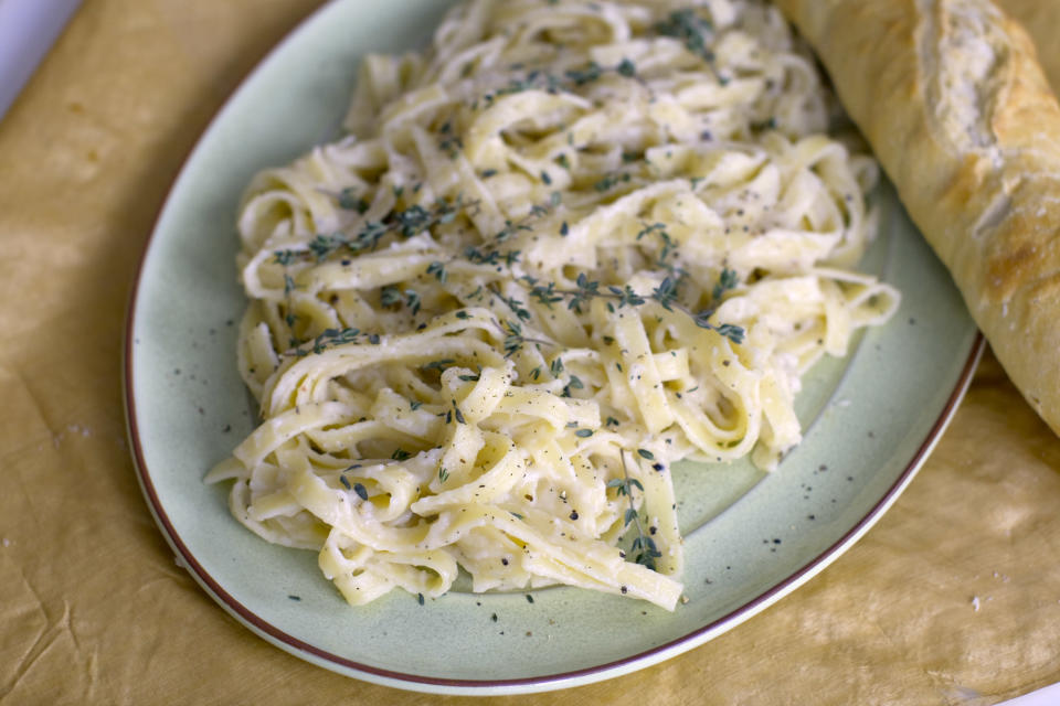 This Jan. 27, 2014 photo show fettuccini with garlic parmesan puree in Concord, N.H. (AP Photo/Matthew Mead)