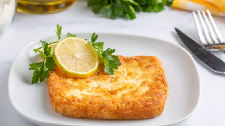 saganaki on plate with lemon