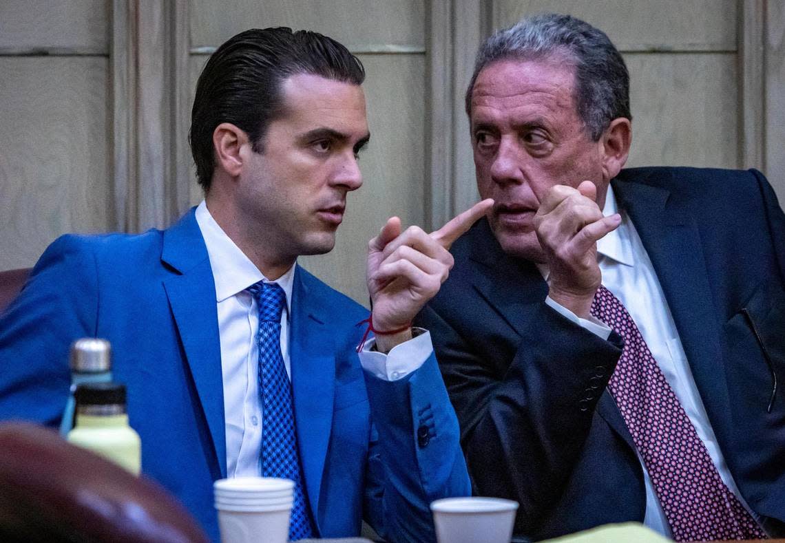 Pablo Lyle, left, talks to attorney Bruce Lehr during his trial in Miami-Dade criminal court Sept. 30, 2022. Lyle is accused of killing 63-year-old Juan Ricardo Hernandez during a road rage incident in 2019.