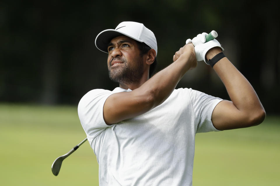 Tony Finau hits toward the ninth green during the third round of the Memorial golf tournament, Saturday, July 18, 2020, in Dublin, Ohio. (AP Photo/Darron Cummings)