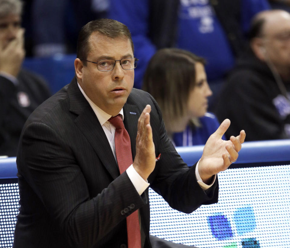 Stanford head coach Jerod Haase applauds his team during the first half of an NCAA college basketball game against Kansas in Lawrence, Kan., Saturday, Dec. 1, 2018. (AP Photo/Orlin Wagner)