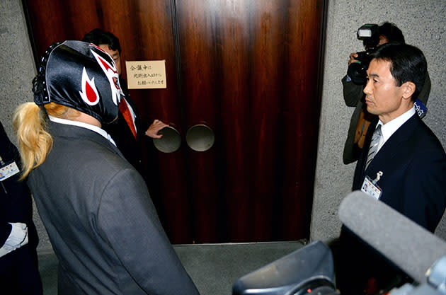 'Skull Reaper A-ji' hears the decision to refuse his attendance. (Photo by The Asahi Shimbun via Getty Images)