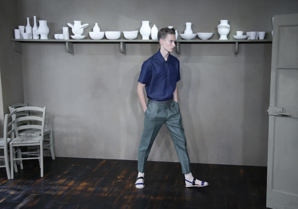 A model wears a creation for Carven's Spring-Summer 2014 men's collection, presented Wednesday, June 26, 2013 in Paris. (AP Photo/Francois Mori)