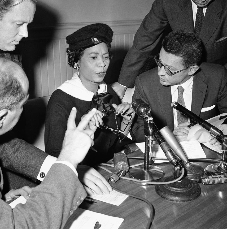 Daisy Bates, president of the Arkansas state conference of the NAACP, answers reporters questions during a news conference at City University of New York's Finley Hall, Nov. 1, 1957. 
(Credit: John Rooney, AP)