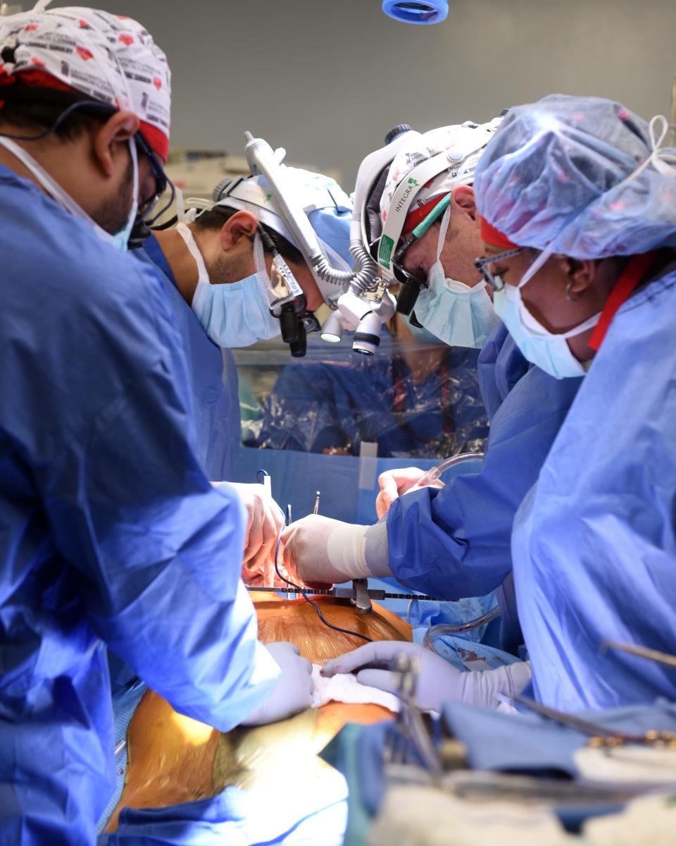 A surgical team at the University of Maryland School of Medicine works to give patient Dave Bennett, 57, of Maryland, a gene-edited pig heart.