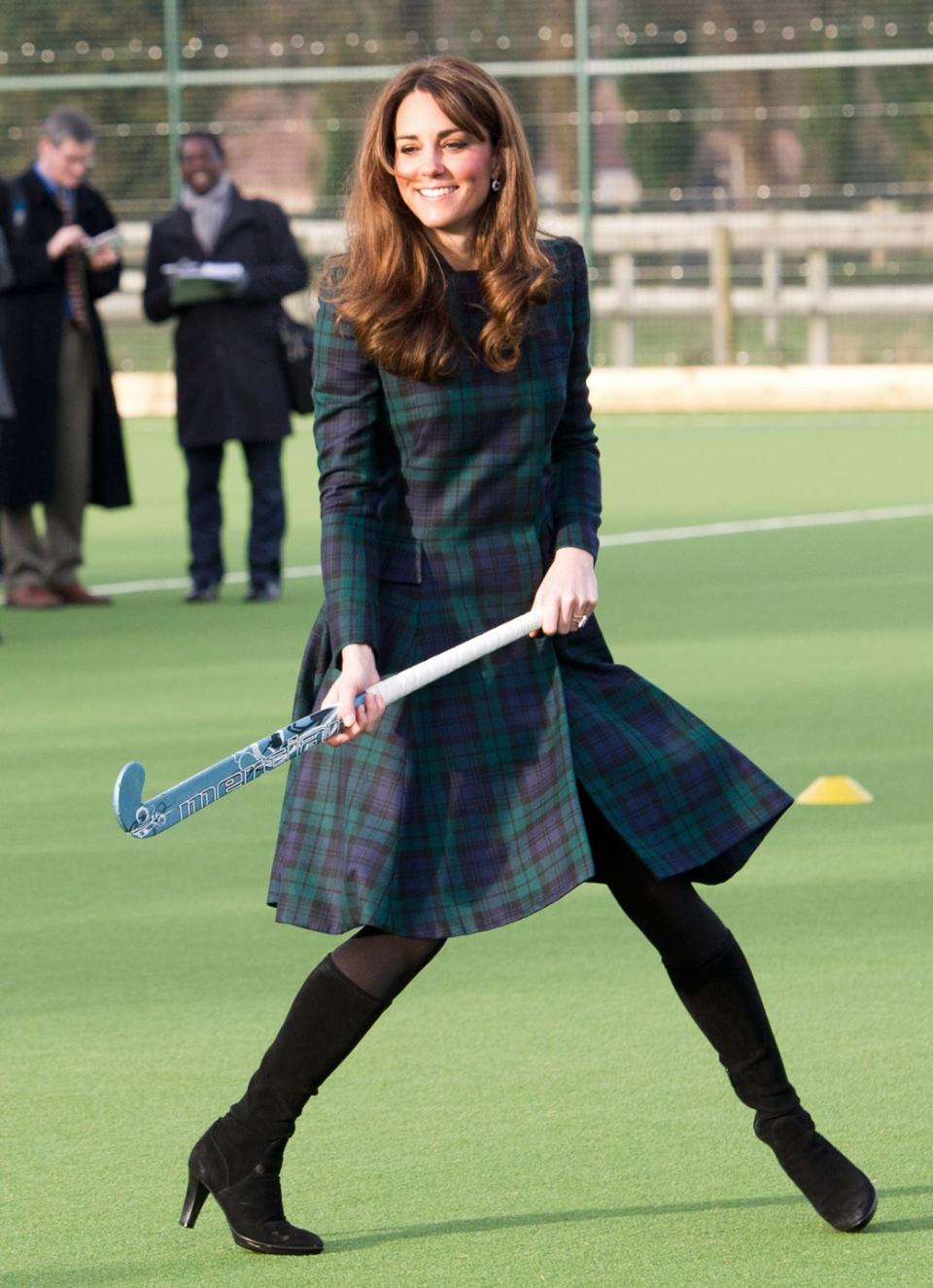 <p>There is literally nothing more British than a tartan jacket, and it’s obviously versatile considering Kate wore hers (with heeled boots!!) to play <em>field hockey</em> at her alma mater in 2012—perhaps not too surprising considering she wore wedges to play volleyball.</p>