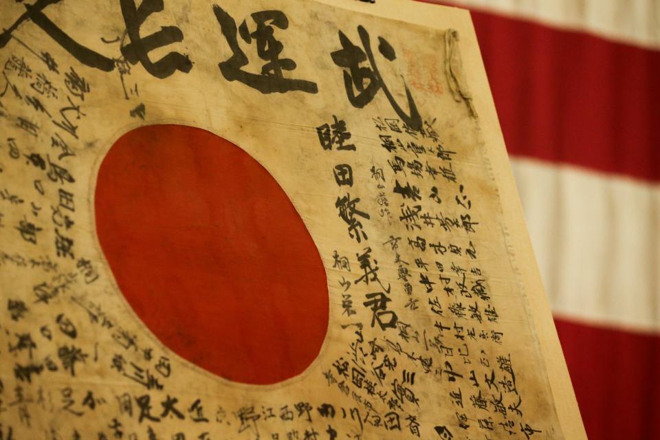 Japanese soldier Shigeyoshi Mutsuda's "good luck" flag had been aboard the USS Lexington Museum on the Bay since 1994. OBON Society, a nonprofit that repatriates flags to Japanese families, visited the museum to retrieve the flag Thursday, July 20, 2023.