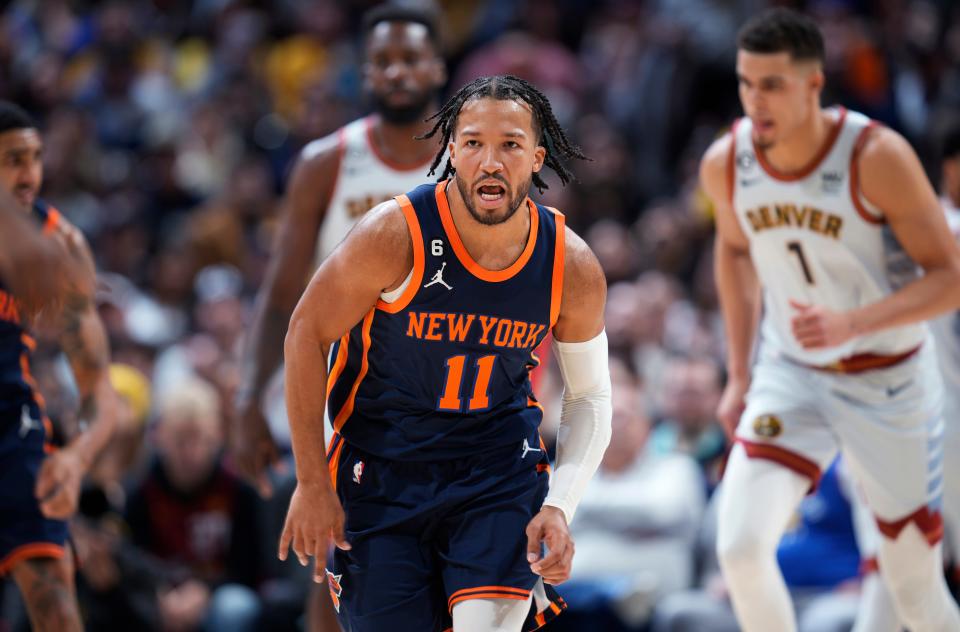 New York Knicks guard Jalen Brunson reacts after hitting a pair of free throws late in the second half of the team's NBA basketball game against the Denver Nuggets on Wednesday, Nov. 16, 2022, in Denver. (AP Photo/David Zalubowski)