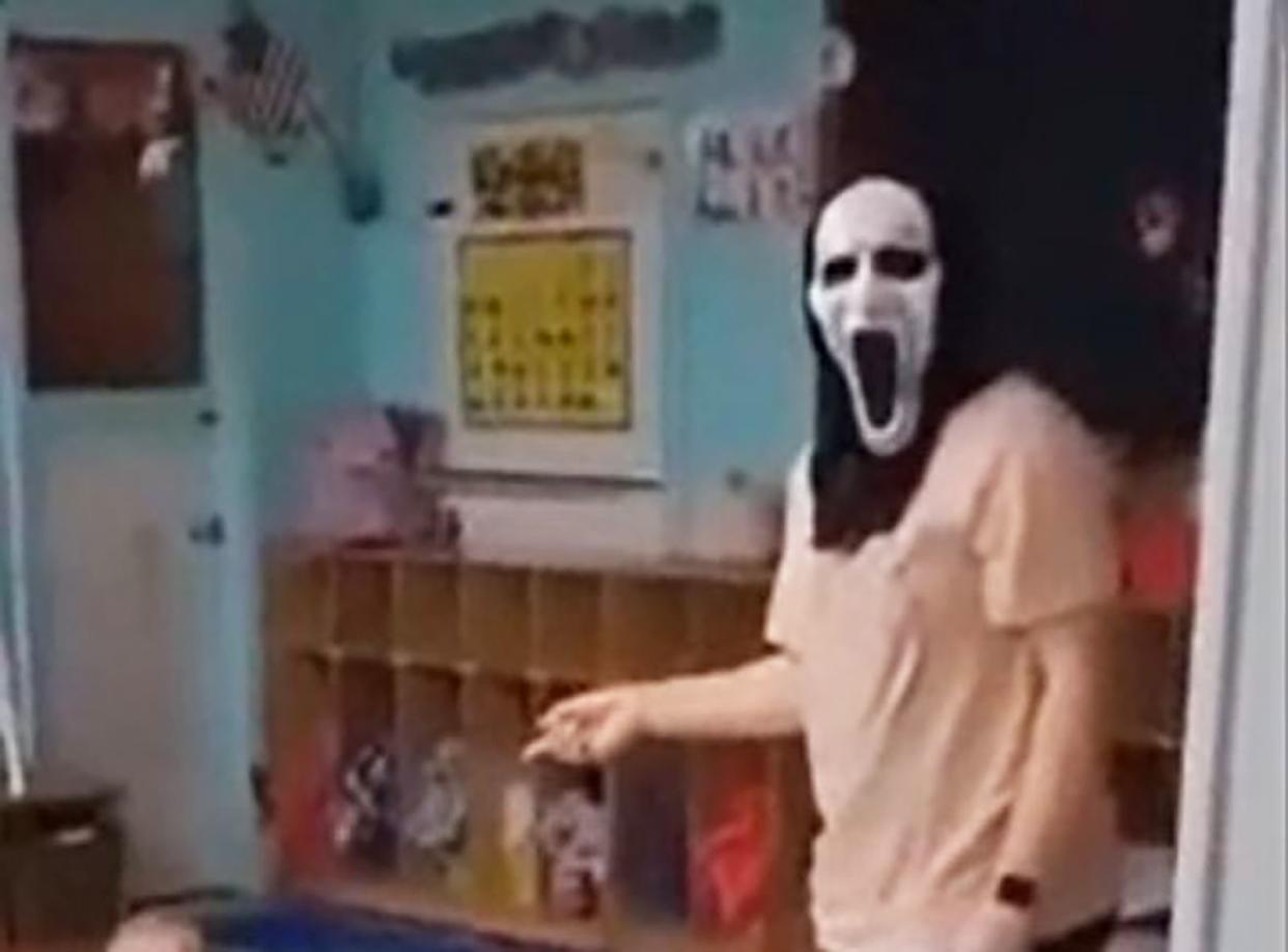 A day care worker is seen in this viral video in Oct. 2022, wearing a mask while working at the lil’ blessings daycare in Hamilton, Mississippi.