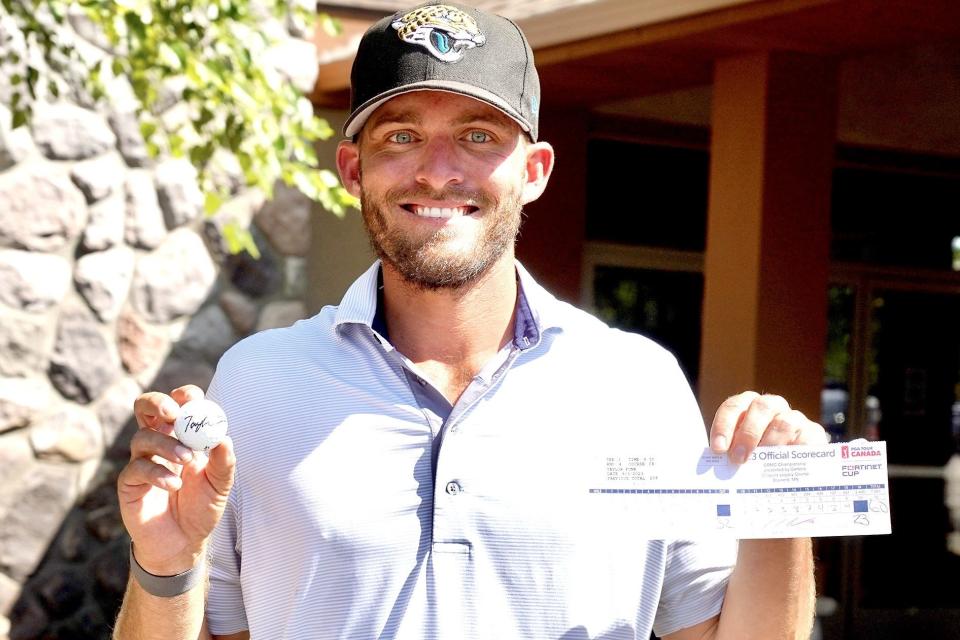 Taylor Funk of Ponte Vedra Beach displays his scorecard and the ball he used to finish a round of 60 on Sunday in a PGA Tour Canada event in Brainerd, Minn. Funk qualified for the Fortinet Cup, for the top-60 on the tour's points lis.