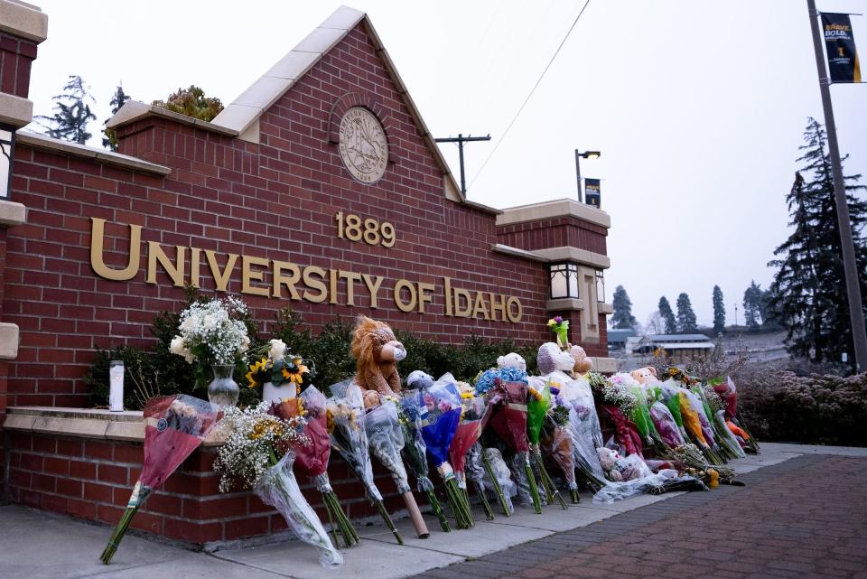 The University of Idaho community mourns the loss of four students through a spontaneous memorial at the entrance to the campus.