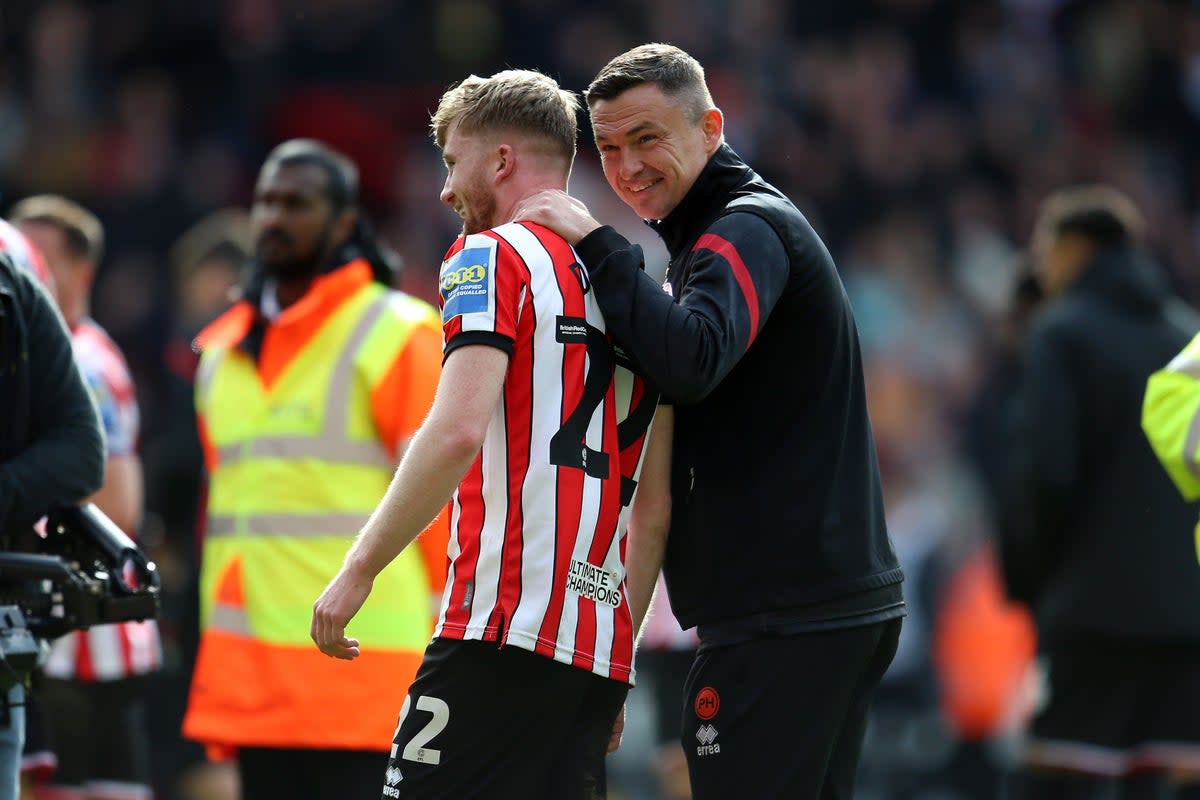 Sheffield United’s Tommy Doyle and manager Paul Heckingbottom (Nigel French/PA). (PA Wire)
