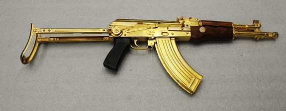 A close view of a gold-plated AK-47 captured in Iraq.