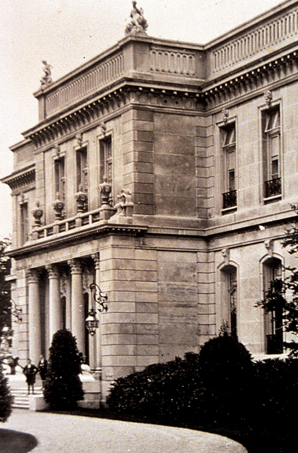 This circa 1920s photo provided by The Preservation Society of Newport County shows footmen on the front stairs of The Elms, a mansion in Newport, R.I. Newly discovered photographs, documents and family histories have inspired the creation of a tour about servants at The Elms, echoing themes of the British drama program, "Downton Abbey." (AP Photo/The Preservation Society of Newport County)