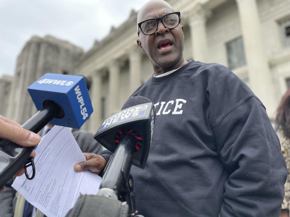 Raymond Flanks talks to reporters outside the New Orleans criminal courthouse on Thursday, Nov. 17, 2022. A judge vacated Flanks' conviction in a 1983 murder and set him free, ending his nearly four decades in prison, after prosecutors and defense lawyers agreed that evidence favorable to him was withheld from his attorneys in the 1980s. (AP Photo/Kevin McGill)