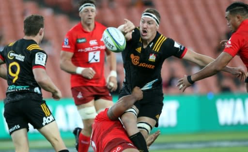 Back after eight weeks: Waikato Chiefs' Brodie Retallick (centre), seen here offloading in a tackle against Japan's Sunwolves in March
