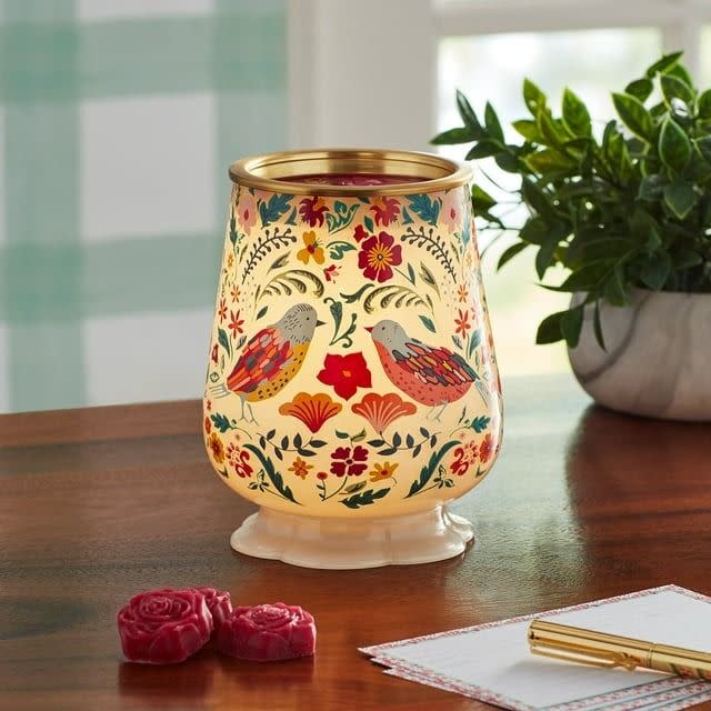 <p><a href="https://go.redirectingat.com?id=74968X1596630&url=https%3A%2F%2Fwww.walmart.com%2Fip%2FThe-Pioneer-Woman-Folky-Bird-Full-Size-Ceramic-Fragrance-Warmer%2F1904491979&sref=https%3A%2F%2Fwww.thepioneerwoman.com%2Fholidays-celebrations%2Fgifts%2Fg42828178%2Fmothers-day-gifts%2F" rel="nofollow noopener" target="_blank" data-ylk="slk:Shop Now;elm:context_link;itc:0;sec:content-canvas" class="link ">Shop Now</a></p><p>The Pioneer Woman Folky Bird Fragrance Warmer</p><p>walmart.com</p><p>$21.88</p><span class="copyright">Walmart</span>