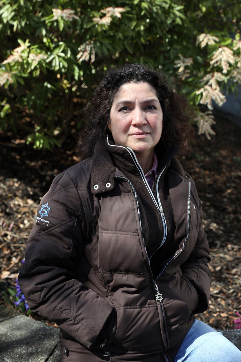 Sandie Ortiz, whose car was struck by a Yonkers police SUV in June, at home in Ossining March 29, 2024. Ortiz has been trying to get the police insurance to cover the $3,000 in damages to her car.
