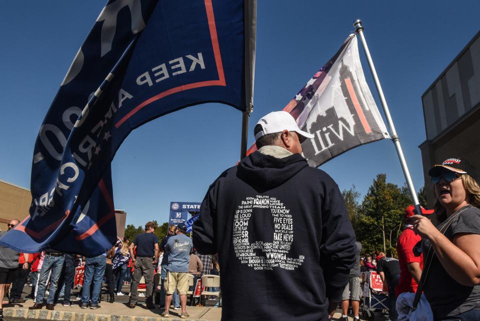 A supporter of President Donald Trump attends a rally Oct. 3, 2020, in Staten Island, New York.