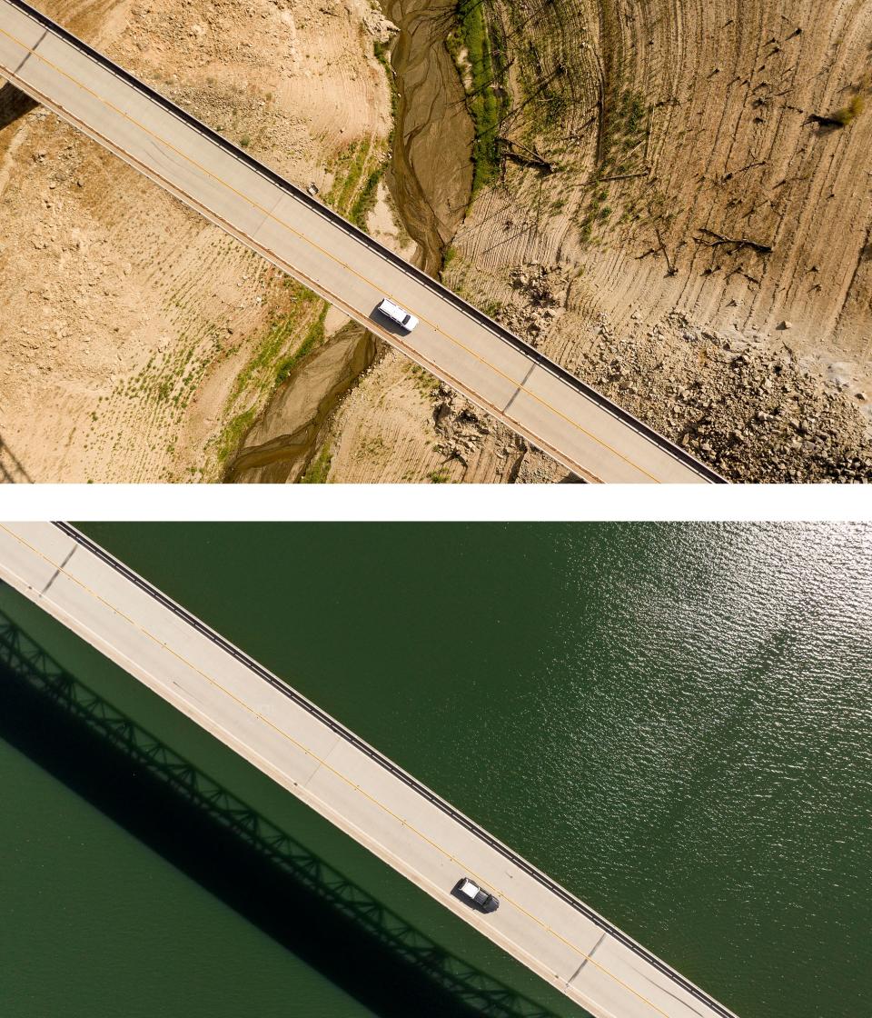 This aerial combination photo created on April 17, 2023, shows a car crossing the Enterprise Bridge at Lake Oroville in Oroville, California, on September 05, 2021 (top), and on April 16, 2023 (below). – A very wet winter has left California’s reservoirs looking healthier than they have for years, as near-record rainfall put a big dent in a lengthy drought.<br>A series of atmospheric rivers — high altitude ribbons of moisture — chugged into the western United States, dousing a landscape that had been baked dry by years of below-average rain. (Photo by JOSH EDELSON / AFP) (Photo by JOSH EDELSON/AFP via Getty Images)