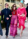 <p>For the wedding of their actress friend Jessica Chastain, Anne Hathaway and Emily Blunt were almost matching in vibrant pink and purple creations.<br><em>[Photo: Rex]</em> </p>