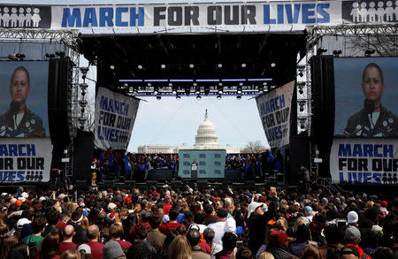 FILE PHOTO: Emma Gonzalez, a student and shooting survivor from the Marjory Stoneman Douglas High School in Parkland, Florida, addresses the conclusion of the "March for Our Lives" event demanding gun control after recent school shootings at a rally in Washington, U.S., March 24, 2018. REUTERS/Aaron P. Bernstein/File Photo